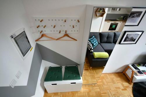 a view of a living room with a couch at Krona Apartments in Bovec
