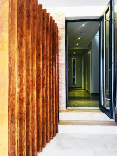 a wooden fence on the side of a building at The Embassy Nord in Bucharest