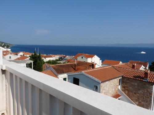 a view of a city from a balcony at Apartmani Sani Bol in Bol