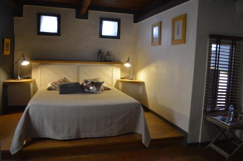 Ένα ή περισσότερα κρεβάτια σε δωμάτιο στο La Chamberte