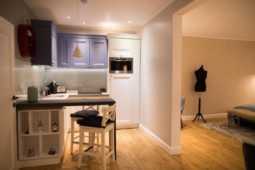 Η κουζίνα ή μικρή κουζίνα στο Quiboo