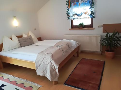 Posteľ alebo postele v izbe v ubytovaní Haus Gandler