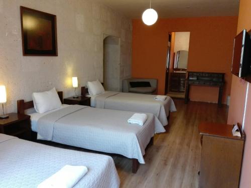 Cama o camas de una habitación en Casablanca Hostal