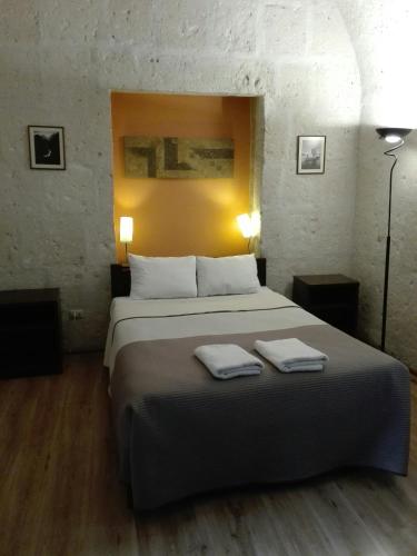 Cama o camas de una habitación en Casablanca Hostal