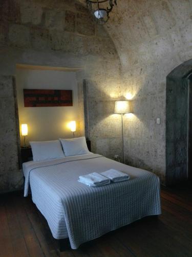 Cama o camas de una habitación en Casablanca Hostal
