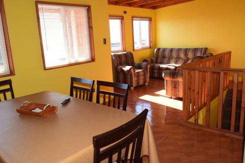 Posezení v ubytování Cabañas Urra House