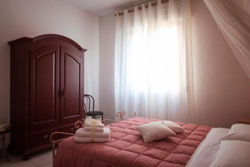 Albergo La Bussolaにあるベッド