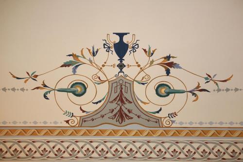 a painting on the wall of a room at Aretusa Vacanze B&B in Siracusa