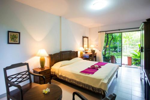 Katil atau katil-katil dalam bilik di Lilawalai Resort