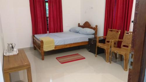 Ένα ή περισσότερα κρεβάτια σε δωμάτιο στο Lakeview homestay