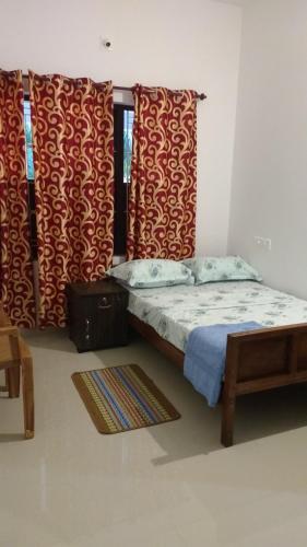 Ένα ή περισσότερα κρεβάτια σε δωμάτιο στο Lakeview homestay