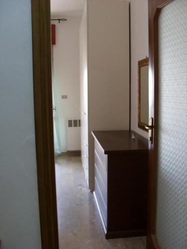 a bathroom with a black counter and a mirror at Casa Vacanze Basilicata da Giannino in Marconia