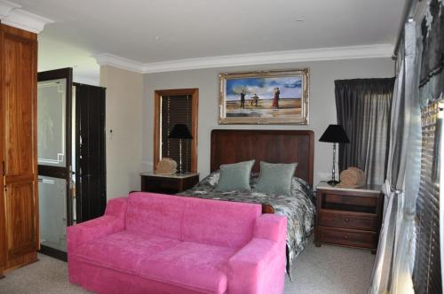 Χώρος καθιστικού στο Clarens Grand Villa