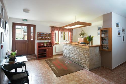 Kuchyň nebo kuchyňský kout v ubytování Hotel Pošta