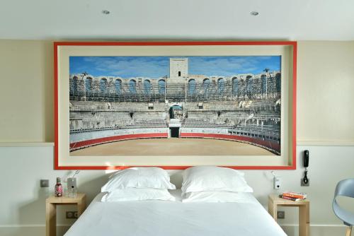 Postel nebo postele na pokoji v ubytování Hotel Spa Le Calendal