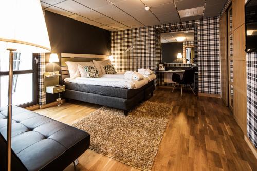 Säng eller sängar i ett rum på Clarion Collection Hotel Bristol