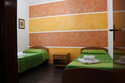 Cama o camas de una habitación en Case Vacanze Paradise Beach Vicino Cefalù PISCINA APERTA