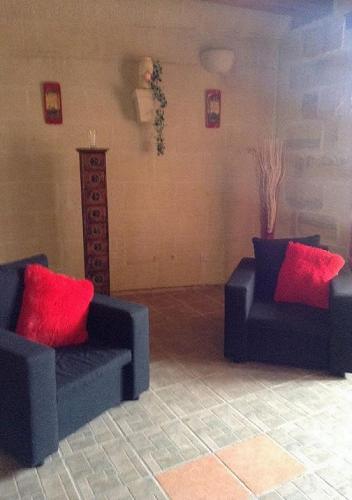 Zona de estar de Ta' Karkar Villa Bed and Breakfast