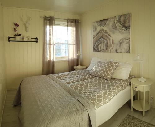 Postel nebo postele na pokoji v ubytování Tore Hunds Apartments