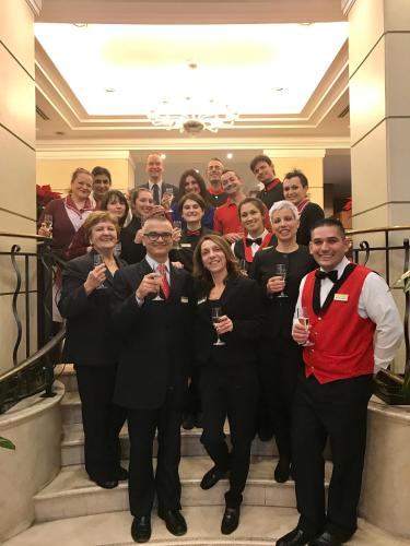 a group of people posing for a picture at Hotel dei Mellini in Rome