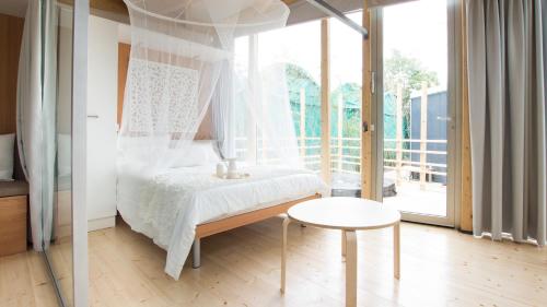 Posteľ alebo postele v izbe v ubytovaní Ecosuite & SPA