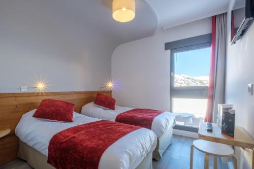 Postel nebo postele na pokoji v ubytování Village Le Grand Fourchon