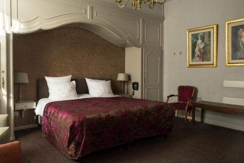 Hotel Duc De Bourgogne 객실 침대