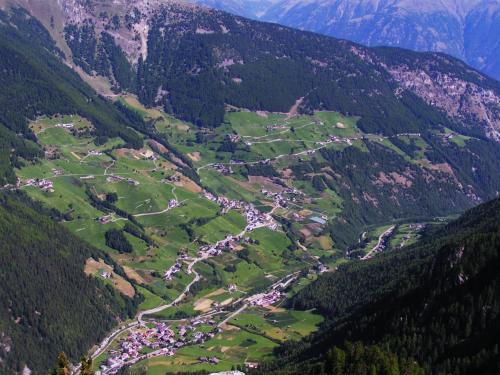 an aerial view of a valley in the mountains at Ferienwohnungen Auhaus in Martello