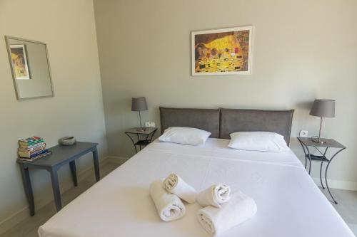 Cama o camas de una habitación en Amera - Troumpas Family Apartments