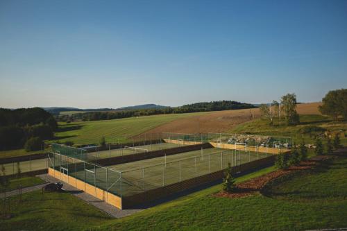 an overhead view of a tennis court in a field at Statek česká lípa Myslovice in Klatovy