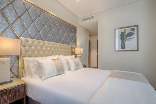 Voodi või voodid majutusasutuse Hotel MeraPrime Gold Lisboa toas