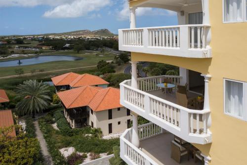 an aerial view of a house with balconies at Blue Bay Apartments in Sint Michiel