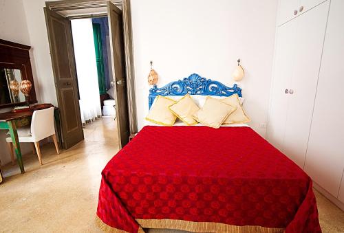 Postel nebo postele na pokoji v ubytování Palazzo Salapolis - Luxury Apartments