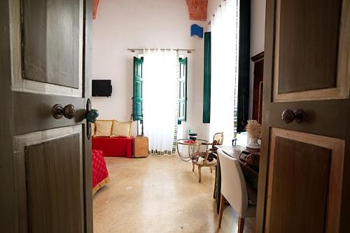 TV a/nebo společenská místnost v ubytování Palazzo Salapolis - Luxury Apartments