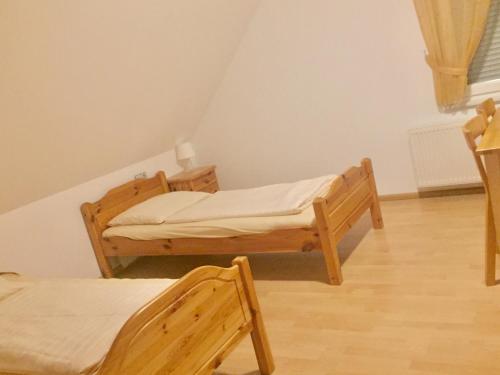 Ein Bett oder Betten in einem Zimmer der Unterkunft Hotel Restaurant Parthenon