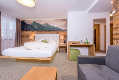 Posteľ alebo postele v izbe v ubytovaní Mountain Resort M&M