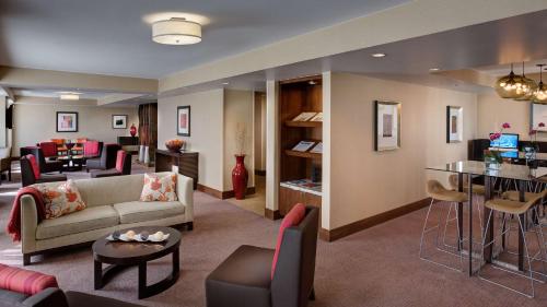 a living room filled with furniture and a tv at Grand Hyatt San Antonio River Walk in San Antonio