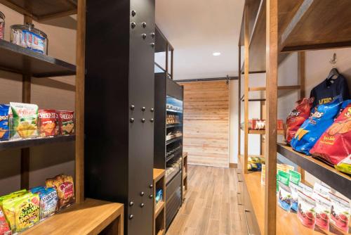 a walk in pantry with lots of food at Hyatt Place Ann Arbor in Ann Arbor