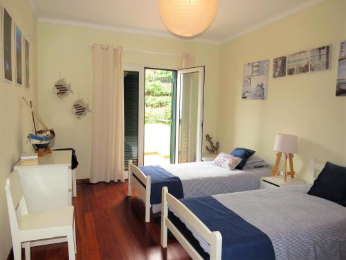 Ένα ή περισσότερα κρεβάτια σε δωμάτιο στο Apartment Villa Sol II