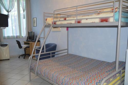 Katil atau katil-katil dalam bilik di Garda Apartments in Euroresidence