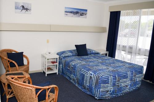 Кровать или кровати в номере Culcairn Motor Inn