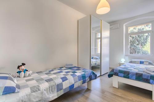 Postel nebo postele na pokoji v ubytování Apartment Spagnolo City