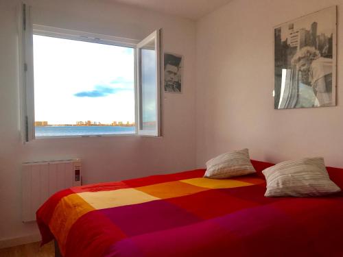 Posteľ alebo postele v izbe v ubytovaní Impresionantes Vistas al Mar Menor