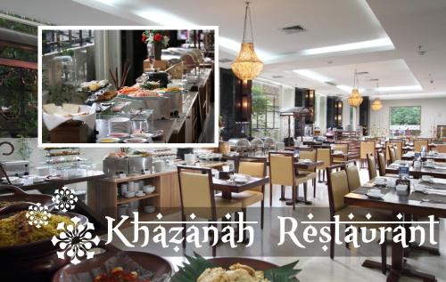 a restaurant with tables and chairs and a sign that reads kazakh restaurant at Hotel Namira Syariah Pekalongan in Pekalongan