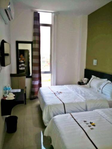 Una cama o camas en una habitación de Comfort Inn