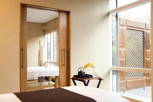 Cama ou camas em um quarto em Park Hyatt Mendoza Hotel, Casino & Spa