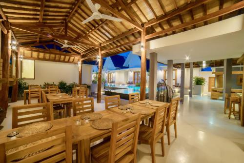 Restoran või mõni muu söögikoht majutusasutuses Ponte Villas