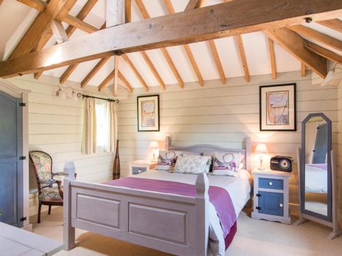 Ένα ή περισσότερα κρεβάτια σε δωμάτιο στο Stable Cottage