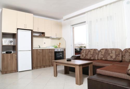 Кухня или кухненски бокс в Sinanis Family Apartments