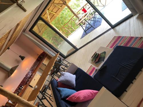 an overhead view of a living room with a couch at Pili Pili Boutique Hotel in Kigali